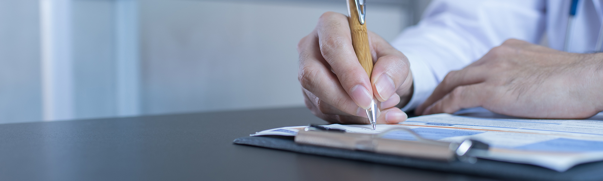 A doctor writing a prescription